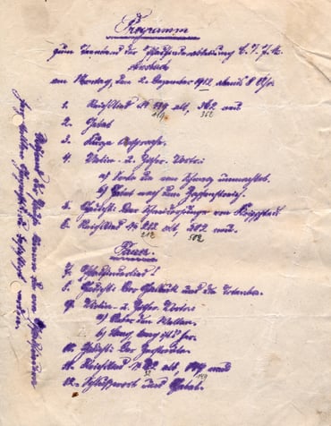 Ein Veranstaltungsprogramm von 1912 in handschriftlicher Form